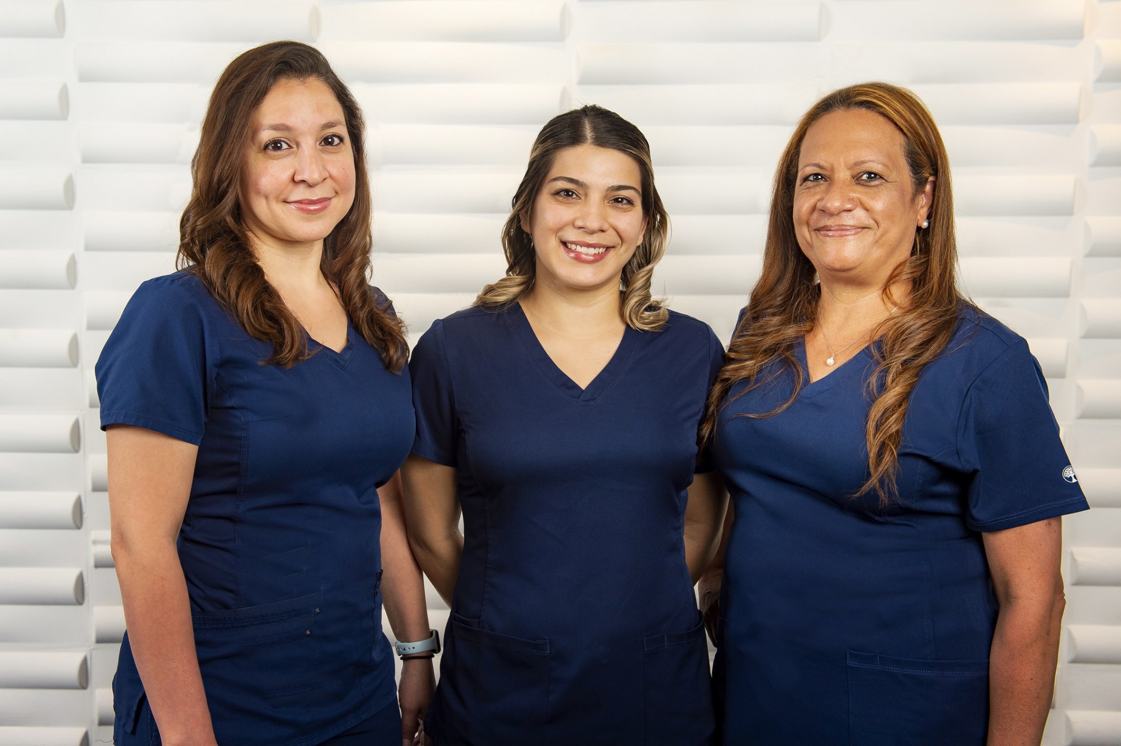 three female employees at Washington Oral & Facial Surgery