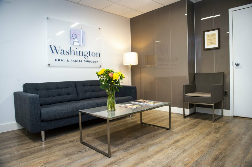 lobby of Washington Oral & Facial Surgery with sofa, chair and table